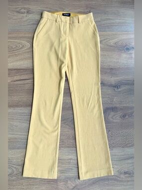 Express | Columnist Barely Boot Pants Size 0R Yellow Stretch Mid Rise